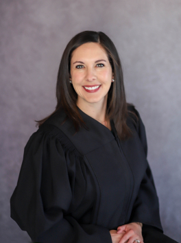 Portrait of Honorable Tayler Thomas in black judicial robe.