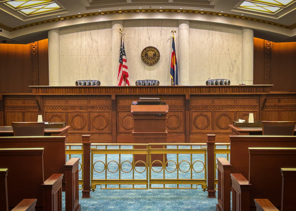 Colorado Court of Appeals inside courtroom. The bench with 3 member judge seats.